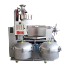 High-capacity screw oil press processing peanuts and sesame.