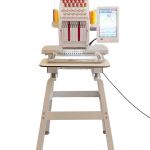 Compact embroidery machine with 12 or 15 needles, color LCD touch screen, and 270-degree wide cap frame.