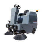 Industrial floor sweeper riding and cleaning large indoor and outdoor areas.