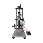 Pneumatic vacuum liquid filling machine for perfume bottles with consistent level filling system.